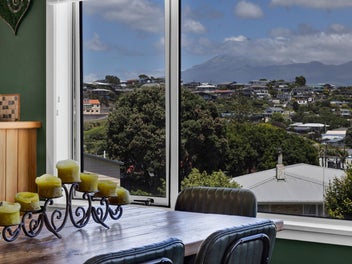 Superb Views, Spacious Home & Extra Large Garaging