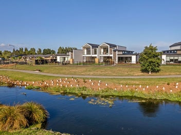 Architectural Townhouse with Streamside View!