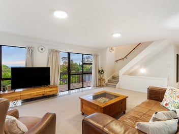 SUN-FILLED CEDAR HOME WITH ELEVATED VIEWS!