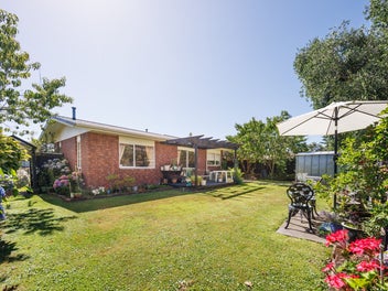 Brick Beauty with Established Gardens