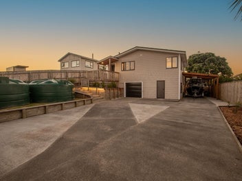 Sunny, Elevated Coastal Living with Stunning Views
