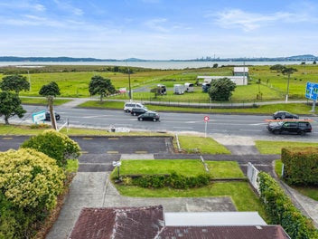 Uninterrupted City Views – Tremendous Potential!