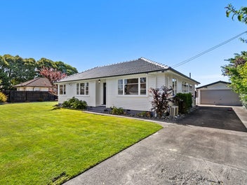 Sun-Soaked Family Living with Entertainer's Deck
