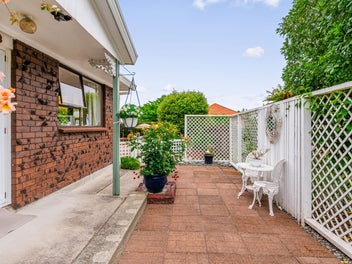 Brick And Tile With An Outdoor Retreat!