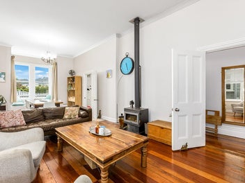 STUNNING SUNNY CHARACTER HOME WITH INCOME