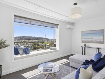 Elevated and Sun-Drenched with Grandstand Views