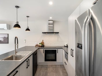 Near-New Durie Hill Living – Why Build?