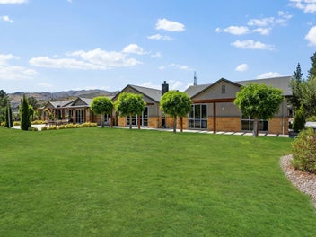 Upscale Residence with Proven Income Potential