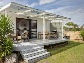 Renovated living, moments from the beach.