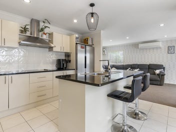 RANGI GOLD! BRICK WITH HEATED POOL ACT FAST!