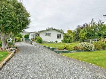 Beautifully Maintained and Accessible Home Awaits