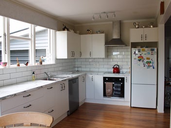 Renovated & Central - With a Spacious Back Yard!