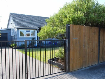 Renovated & Central - With a Spacious Back Yard!