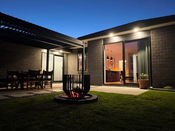 A standout home with triple garaging