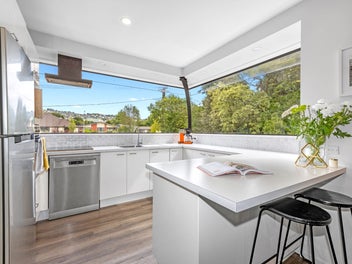 Peaceful Riverside Living with City Convenience