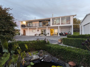 Two levels, five bedrooms, one exceptional address