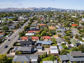 Five Car Garaging + Self Contained Studio!