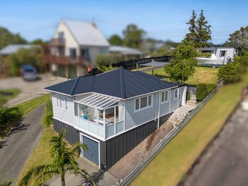 Dual-Dwelling Opportunity with Sea Views