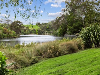 A Rare Riverfront Estate - Owners Meeting Market!