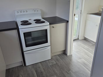 Lovely sunny 2 bedroom home large section