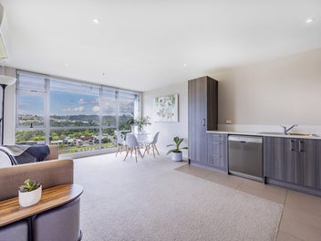 Top-Floor Living with a Rare Green Outlook