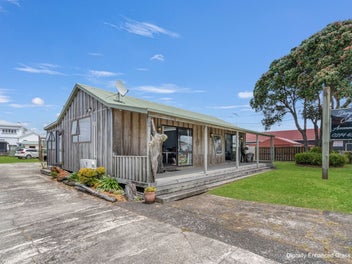 Two Homes, Commercial Zoning, Many Options.