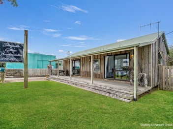 Two Homes, Commercial Zoning, Many Options.