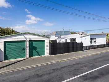 Sun-Soaked with Double Garage on Prime Corner Site