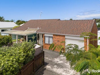 Tucked Away, Steps from the Beach