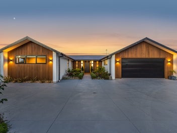 Luxury living, land and a pool!