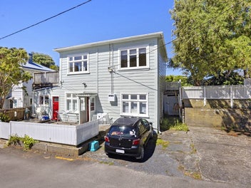 Versatile Character Home with Income