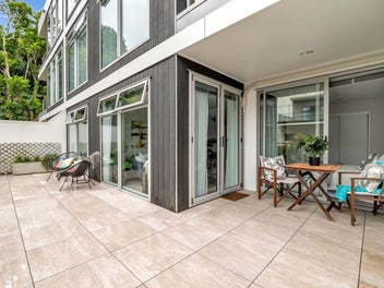 A Sun-Soaked Apartment with Outdoor Appeal