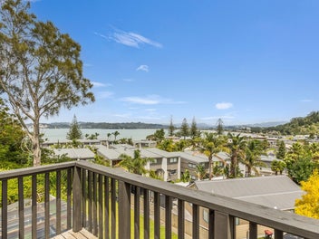 RENOVATED 3 BEDROOM BACH WITH SEA VIEWS.