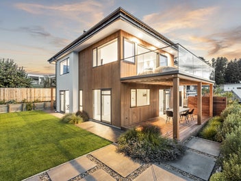 Large family living with panoramic lake views