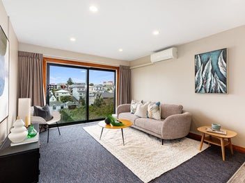 LOW MAINTENANCE. LIKE NEW. GARAGING.