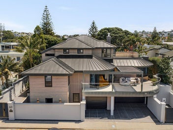 A rare coastal masterpiece moments from the beach