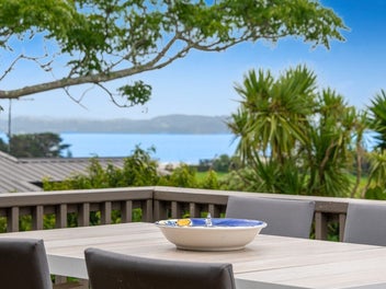 Elevated Home with Expansive Decks and Sea Views