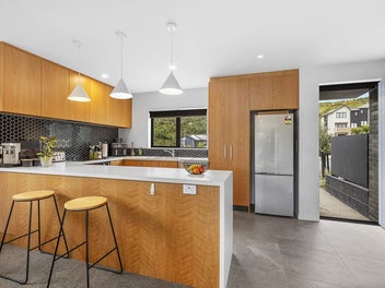 Invest, Nest, or Rest in this Modern Townhouse