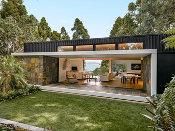 Architectural retreat. Rare headland property.