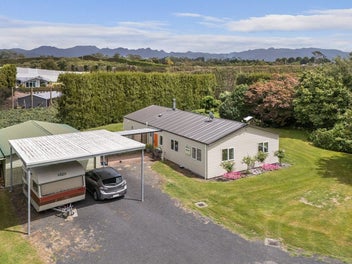 Stylishly Renovated with Exceptional Garaging!