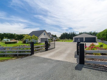 Six car shed & landscaped sanctuary