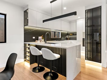 STYLISH FREEHOLD RANGI HOME WITH SEA VIEWS