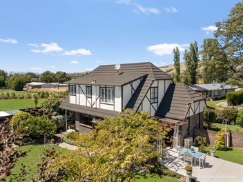 Quietly Impressive, Perfectly Positioned!