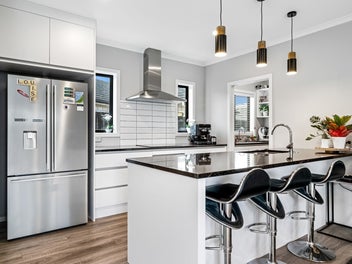 Elevated Family Living with Flexible Spaces