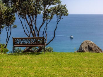 Sweeping ocean views in tightly held position