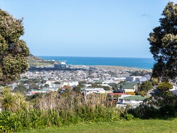 Sun Filled & Spacious With Garaging!