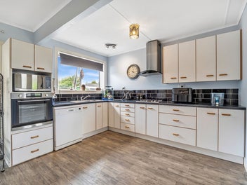 Backyard Bliss with Bonus Garaging