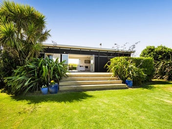 Coastal Calm with Ocean & Mountain Views