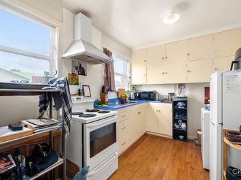 TWO BEDROOM UNIT WITH POTENTIAL