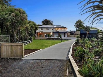 PEACEFUL RIVERSIDE SANCTUARY WITH INCOME POTENTIAL